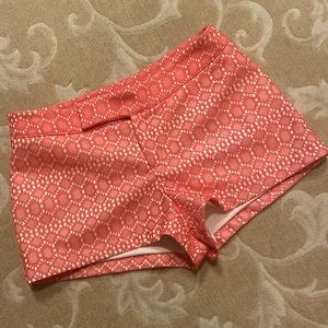 Watermelon colored flat front lace shorts. 1.5” inseam Tab waist, zipper close